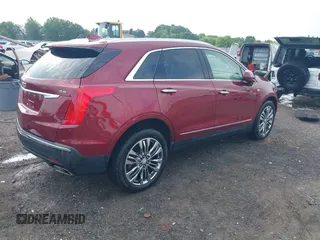 2018 Cadillac XT5 Premium Luxury FWD z VIN 1GYKNERS2JZ242842, wystawiony jako IAAI lot #42297159 z przebiegiem 72 008 mil mil oraz . Historia ofert i sprzedaży dostępna na DreamBid. Obrazek 4.