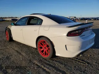 2019 Dodge Charger Scat Pack with VIN 2C3CDXGJXKH520282, listed as a Copart auction lot 87208244 with Not Provided miles and Salvage Title. Bid and sale history available at DreamBid. Image 2.