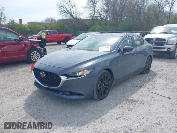 2024 Mazda 3 S Carbon Edition with VIN 3MZBPBCM3RM416565, listed as a IAAI auction lot 42047841 with 11,074 mi miles and . Bid and sale history available at DreamBid. Image 2.