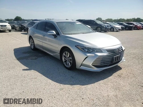 2019 Toyota Avalon XLE z VIN 4T1BZ1FB8KU005001, wystawiony jako Copart lot #54714005 z przebiegiem 62 169 mil mil oraz Czysty tytuł • Clean title. Historia ofert i sprzedaży dostępna na DreamBid. Obrazek 13.