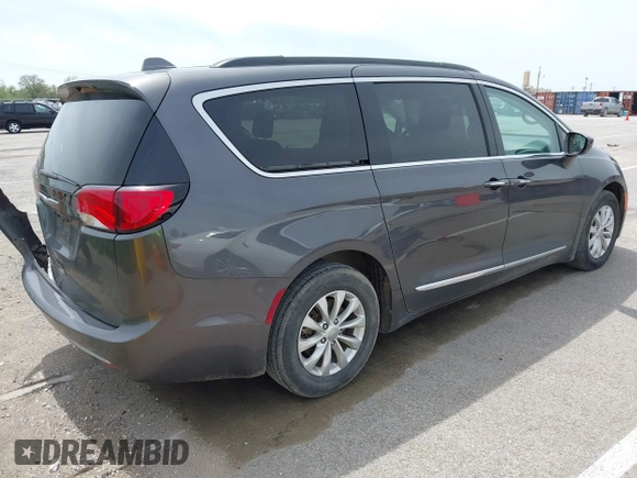 2017 Chrysler Pacifica Touring L with VIN 2C4RC1BG1HR540246, listed as a IAAI auction lot 42107768 with 151,268 mi miles and . Bid and sale history available at DreamBid. Image 4.