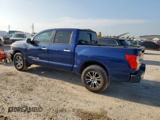 2020 Nissan Titan Platinum Reserve with VIN 1N6AA1EFXLN505021, listed as a Copart auction lot 65716805 with 64,624 mi miles and Salvage title. Bid and sale history available at DreamBid. Image 2.