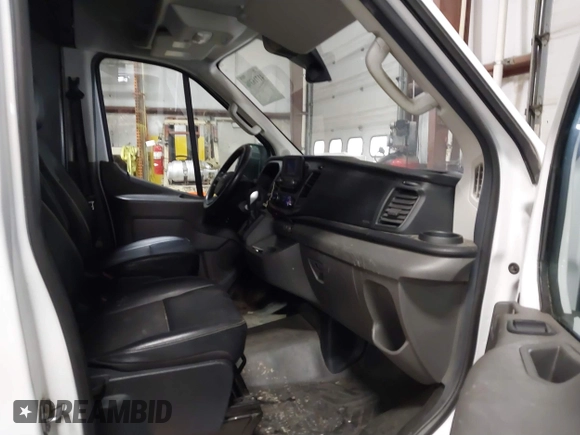 2020 Ford Transit Cargo z VIN 1FTBR2C84LKA08946, wystawiony jako IAAI lot #41716396 z przebiegiem 77 272 mil mil oraz . Historia ofert i sprzedaży dostępna na DreamBid. Obrazek 5.