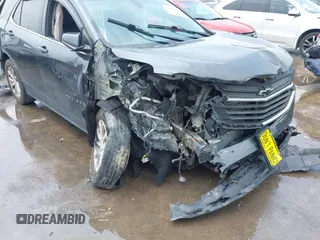 2018 Chevrolet Equinox LT z VIN 2GNAXSEV0J6272001, wystawiony jako IAAI lot #42185011 z przebiegiem 108 899 mil mil oraz . Historia ofert i sprzedaży dostępna na DreamBid. Obrazek 6.