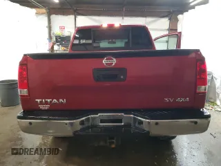 2014 Nissan Titan Pro-4X z VIN 1N6AA0EC6EN501437, wystawiony jako Copart lot #82822234 z przebiegiem 131 112 mil mil oraz Szkoda całkowita • Salvage title. Historia ofert i sprzedaży dostępna na DreamBid. Obrazek 6.
