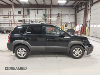 2007 Hyundai Tucson SE with VIN KM8JN12D07U568047, listed as a IAAI auction lot 41932254 with 160,052 mi miles. Bid and sale history available at carsss.com. Image 14.