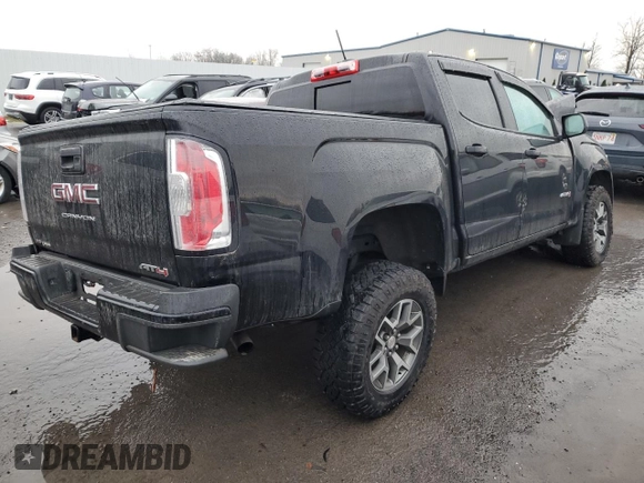 2022 GMC Canyon 4WD AT4 w/Cloth with VIN 1GTG6FENXN1264798, listed as a Copart auction lot 83303824 with 0 mi miles and Salvage Title. Bid and sale history available at carsss.com. Image 3.