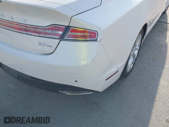 2016 Lincoln MKZ with VIN 3LN6L2JK0GR627283, listed as a IAAI auction lot 42271206 with 52,890 mi miles and . Bid and sale history available at DreamBid. Image 20.