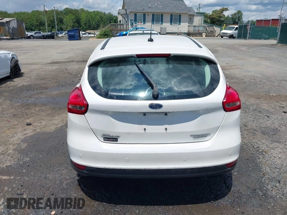 2016 Ford Focus Titanium with VIN 1FADP3N21GL309340, listed as a IAAI auction lot 42518653 with 101,555 mi miles and . Bid and sale history available at DreamBid. Image 16.