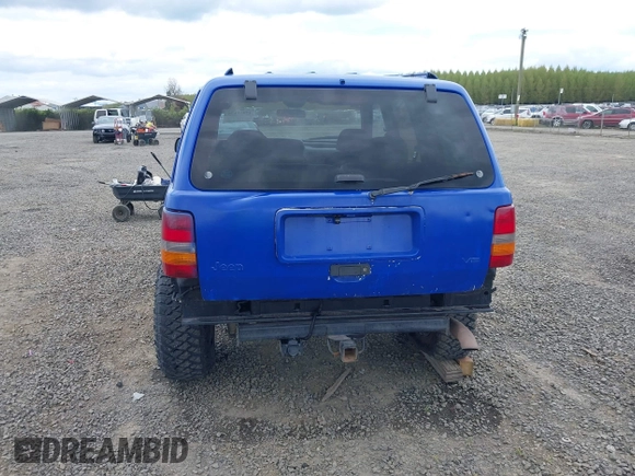 1996 Jeep Grand Cherokee Laredo with VIN 1J4GZ58YXTC329037, listed as a IAAI auction lot 42051175 with 314,571 mi miles and . Bid and sale history available at DreamBid. Image 16.