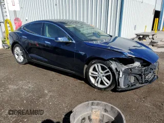 2014 Tesla Model S 60 z VIN 5YJSA1H10EFP35319, wystawiony jako Copart lot #53868745 z przebiegiem 209 424 mil mil oraz Szkoda całkowita • Salvage title. Historia ofert i sprzedaży dostępna na DreamBid. Obrazek 4.