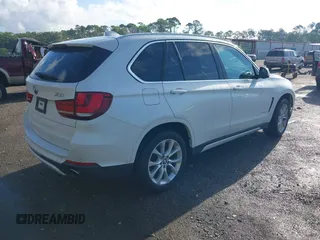 2015 BMW X5 xDrive35i z VIN 5UXKR0C53F0K58025, wystawiony jako IAAI lot #42222805 z przebiegiem 95 979 mil mil oraz . Historia ofert i sprzedaży dostępna na DreamBid. Obrazek 4.
