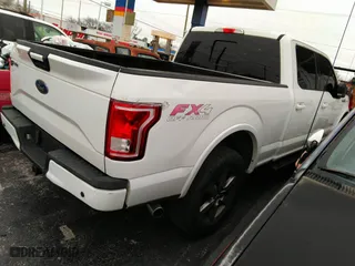 2015 Ford F-150 XLT w/HD Payload Pkg with VIN 1FTFW1EG8FFA12438, listed as a IAAI auction lot 41743982 with 174,799 mi miles. Bid and sale history available at carsss.com. Image 4.