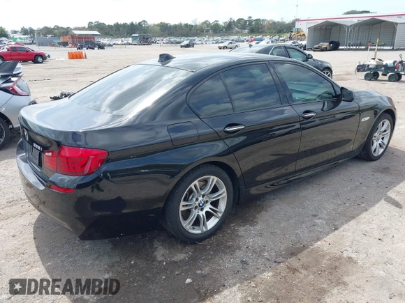 2013 BMW 5 Series 528i with VIN WBAXG5C51DDY33333, listed as a IAAI auction lot 41685179 with 94,936 mi miles and . Bid and sale history available at carsss.com. Image 4.