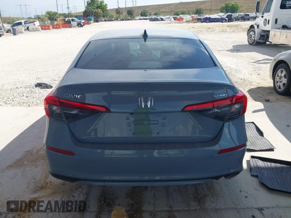 2022 Honda Civic Sport with VIN 2HGFE2F53NH561551, listed as a IAAI auction lot 41865892 with 24,011 mi miles and . Bid and sale history available at carsss.com. Image 16.