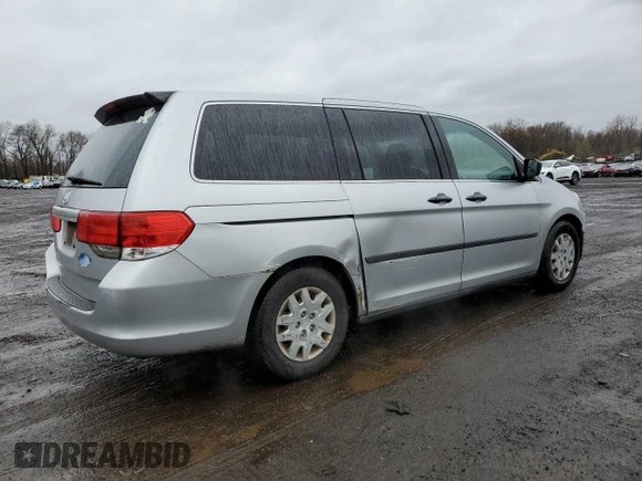 2010 Honda Odyssey LX z VIN 5FNRL3H20AB012805, wystawiony jako Copart lot #52243405 z przebiegiem 206 479 mil mil oraz Szkoda całkowita • Salvage title. Historia ofert i sprzedaży dostępna na DreamBid. Obrazek 3.