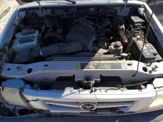 2003 Mazda B-Series 2WD Truck DS with VIN 4F4YR46E13TM02980, listed as a Copart auction lot 81691084 with 179,234 mi miles and Salvage Title. Bid and sale history available at carsss.com. Image 11.