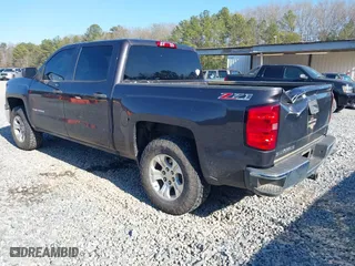 2014 Chevrolet Silverado 1500 LT with VIN 3GCUKREC6EG553001, listed as a IAAI auction lot 41415936 with 254,622 mi miles. Bid and sale history available at carsss.com. Image 3.