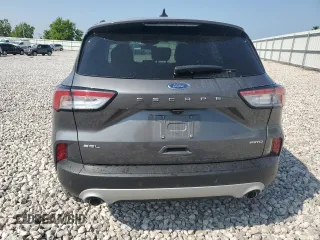 2021 Ford Escape SEL z VIN 1FMCU9H69MUA65731, wystawiony jako Copart lot #59890575 z przebiegiem 113 469 mil mil oraz Czysty tytuł • Clean title. Historia ofert i sprzedaży dostępna na DreamBid. Obrazek 6.