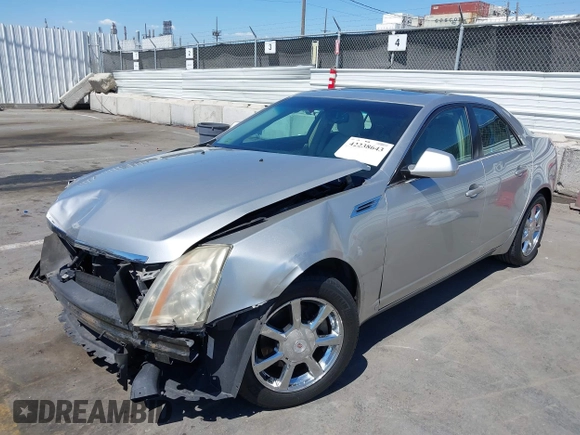 2008 Cadillac CTS RWD with VIN 1G6DM577280111413, listed as a IAAI auction lot 42238643 with 114,706 mi miles and . Bid and sale history available at DreamBid. Image 2.
