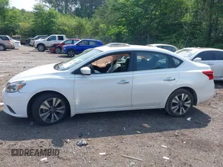 2019 Nissan Sentra S z VIN 3N1AB7AP8KY302151, wystawiony jako IAAI lot #42150965 z przebiegiem 138 486 mil mil oraz . Historia ofert i sprzedaży dostępna na DreamBid. Obrazek 13.