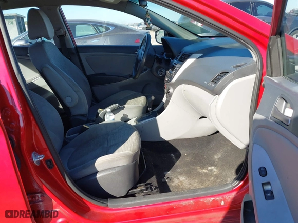 2015 Hyundai Accent GLS with VIN KMHCT4AE8FU833113, listed as a IAAI auction lot 40975977 with 143,038 mi miles. Bid and sale history available at carsss.com. Image 5.