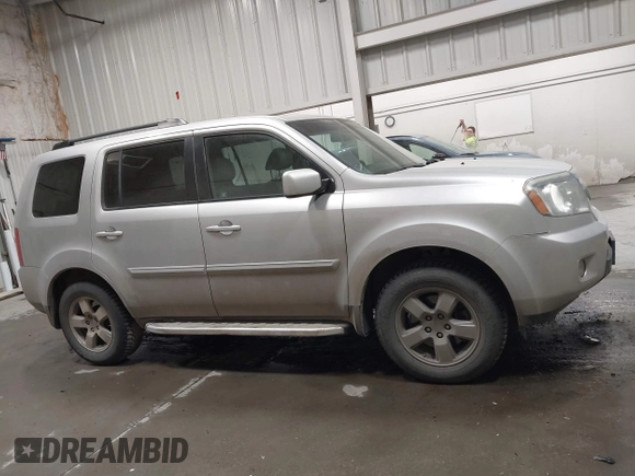 2011 Honda Pilot EX-L with VIN 5FNYF4H66BB029802, listed as a IAAI auction lot 42101545 with 240,127 mi miles and . Bid and sale history available at carsss.com. Image 13.