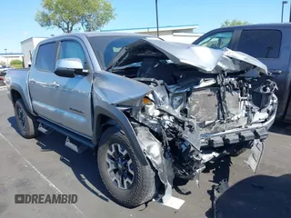2022 Toyota Tacoma SR z VIN 3TMCZ5AN1NM518343, wystawiony jako IAAI lot #42227858 z przebiegiem 24 946 mil mil oraz . Historia ofert i sprzedaży dostępna na DreamBid. Obrazek 1.