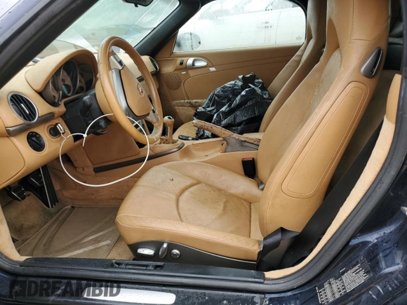 2005 Porsche Boxster с VIN WP0CA29875U713041, выставлен на аукционе Copart как лот 74948004 с пробегом Не указан миль и Списание • Salvage title. История ставок и продаж доступна на DreamBid. Изображение 7.
