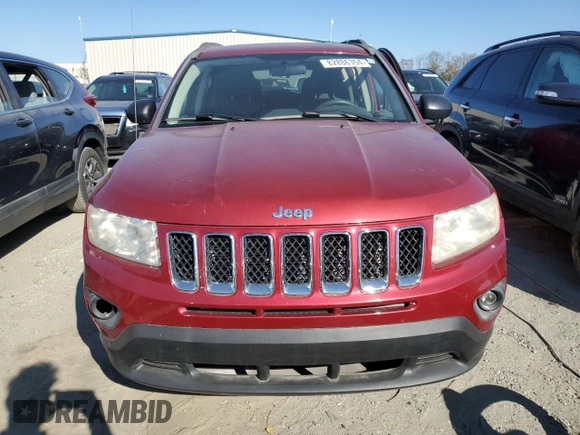 2012 Jeep Compass Sport with VIN 1C4NJCBB2CD631834, listed as a Copart auction lot 82886354 with 208,705 mi miles and Salvage Title. Bid and sale history available at carsss.com. Image 5.