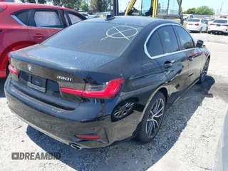 2021 BMW 3 Series 330i with VIN 3MW5R1J09M8C21377, listed as a IAAI auction lot 41892259 with Not Provided miles and . Bid and sale history available at carsss.com. Image 4.