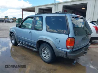1998 Ford Explorer Sport z VIN 1FMYU22X5WUA69552, wystawiony jako IAAI lot #42122419 z przebiegiem 378 457 mil mil oraz . Historia ofert i sprzedaży dostępna na DreamBid. Obrazek 3.
