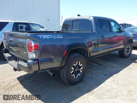 2023 Toyota Tacoma SR5 z VIN 3TMDZ5BN6PM153633, wystawiony jako IAAI lot #42353187 z przebiegiem 50 020 mil mil oraz . Historia ofert i sprzedaży dostępna na DreamBid. Obrazek 4.