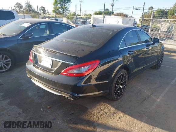 2012 Mercedes-Benz CLS-Class CLS 550 with VIN WDDLJ7DB9CA018502, listed as a IAAI auction lot 42051316 with 218,404 mi miles. Bid and sale history available at carsss.com. Image 4.