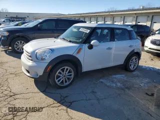 2016 MINI Countryman with VIN WMWZB3C58GWM33239, listed as a Copart auction lot 89364605 with 152,358 mi miles and Salvage title. Bid and sale history available at DreamBid. Image 1.