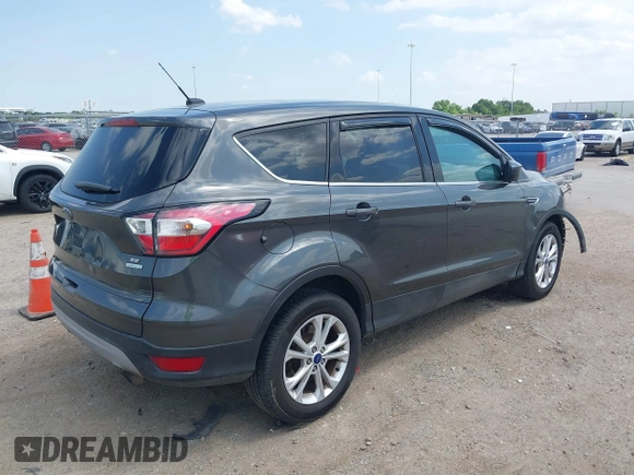 2017 Ford Escape SE z VIN 1FMCU0GD1HUE71410, wystawiony jako IAAI lot #42026516 z przebiegiem 173 804 mil mil oraz . Historia ofert i sprzedaży dostępna na DreamBid. Obrazek 4.