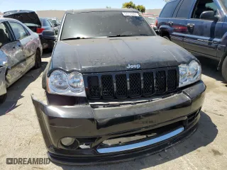 2007 Jeep Grand Cherokee SRT-8 with VIN 1J8HR78387C603473, listed as a Copart auction lot 57712964 with 114,429 mi miles and Salvage Title. Bid and sale history available at carsss.com. Image 5.