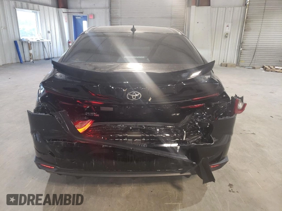 2025 Toyota Camry LE with VIN 4T1DAACK9SU517015, listed as a Copart auction lot 48926045 with 7,797 mi miles and Salvage Title. Bid and sale history available at DreamBid. Image 6.