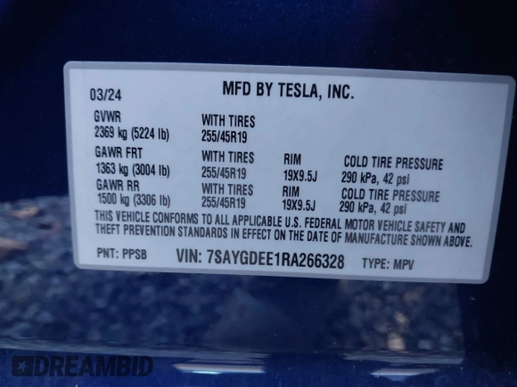 2024 Tesla Model Y Long Range with VIN 7SAYGDEE1RA266328, listed as a IAAI auction lot 40610351 with 13,573 mi miles. Bid and sale history available at carsss.com. Image 9.