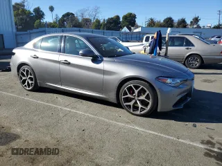 2021 Alfa Romeo Giulia Ti Sport with VIN ZARFAMBN9M7648222, listed as a Copart auction lot 42215985 with 50,861 mi miles and Salvage title. Bid and sale history available at DreamBid. Image 4.
