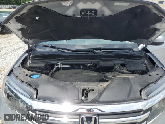 2018 Honda Pilot EX-L with VIN 5FNYF5H55JB020679, listed as a Copart auction lot 56469725 with 62,561 mi miles and Salvage title. Bid and sale history available at DreamBid. Image 12.
