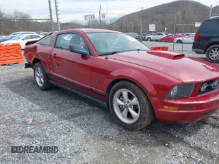 2008 Ford Mustang Deluxe with VIN 1ZVHT80N785127022, listed as a IAAI auction lot 41869865 with 73,292 mi miles. Bid and sale history available at carsss.com. Image 1.