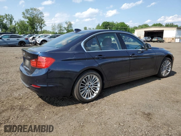 2015 BMW 3 Series 328i xDrive with VIN WBA3B5G50FNS16915, listed as a Copart auction lot 61603915 with 137,059 mi miles and Salvage title. Bid and sale history available at DreamBid. Image 3.