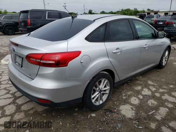 2017 Ford Focus SE with VIN 1FADP3FE2HL263592, listed as a Copart auction lot 65259845 with 74,413 mi miles and Clean title. Bid and sale history available at DreamBid. Image 3.