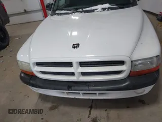 2001 Dodge Dakota with VIN 1B7FL26XX1S304511, listed as a IAAI auction lot 41246101 with 117,457 mi miles. Bid and sale history available at carsss.com. Image 6.
