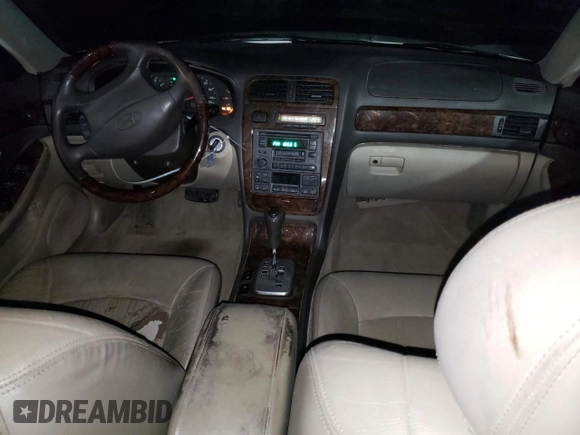 2002 Hyundai XG L z VIN KMHFU45E42A217215, wystawiony jako Copart lot #84450314 z przebiegiem 179 904 mil mil oraz Szkoda całkowita • Salvage title. Historia ofert i sprzedaży dostępna na DreamBid. Obrazek 8.