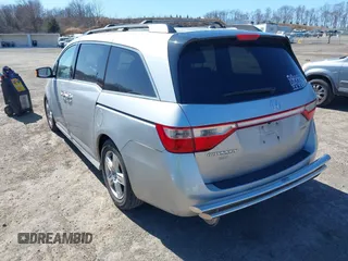 2012 Honda Odyssey Touring with VIN 5FNRL5H93CB042392, listed as a IAAI auction lot 41859533 with 169,141 mi miles. Bid and sale history available at carsss.com. Image 3.