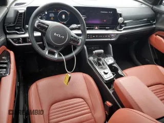 2025 Kia Sportage SX-Prestige z VIN 5XYK53DFXSG235643, wystawiony jako Copart lot #50402875 z przebiegiem 11 912 mil mil oraz Szkoda całkowita • Salvage title. Historia ofert i sprzedaży dostępna na DreamBid. Obrazek 8.