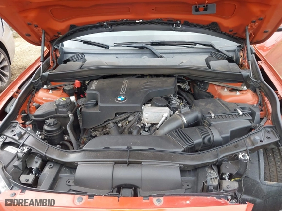 2015 BMW X1 xDrive28i with VIN WBAVL1C50FVY41206, listed as a IAAI auction lot 41508136 with 102,725 mi miles. Bid and sale history available at carsss.com. Image 10.