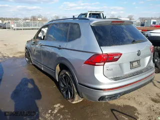 2023 Volkswagen Tiguan SE R-Line Black with VIN 3VV8B7AX1PM024091, listed as a IAAI auction lot 41409100 with 33,262 mi miles. Bid and sale history available at carsss.com. Image 3.